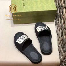 Dep Gucci nam quai ngang mau den hoa tiet chu trang dap logo 9