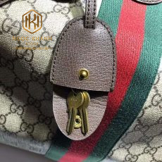 tui du lich gucci mau nau be hoa tiet in logo soc xanh do 4